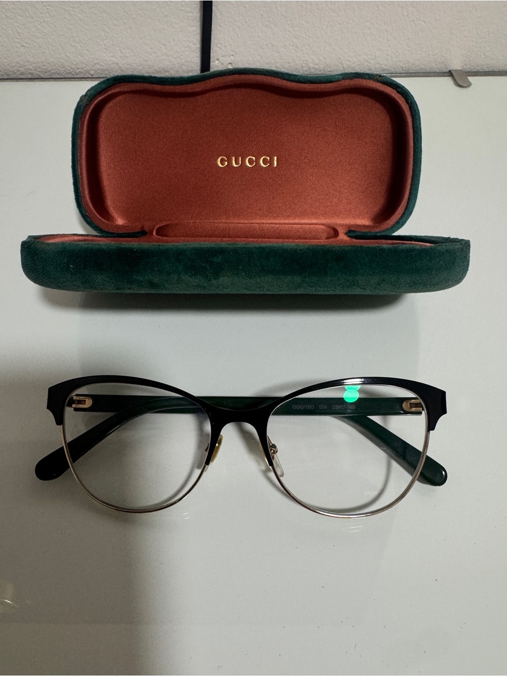 Gucci Black and Gold Round Women's Optical Glasses